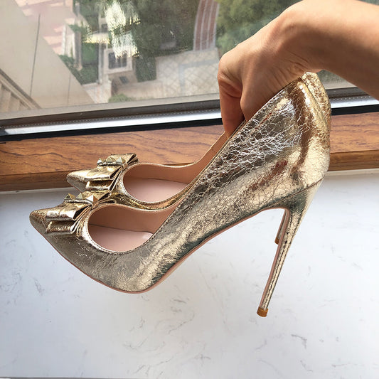 Tikicup Damen-Pumps mit spitzer Spitze und hohem Absatz in weichem Mattgold, Hochzeitsschuhe für die Braut mit Schleife, glänzende Stilettos, große Größe 43 44 45 